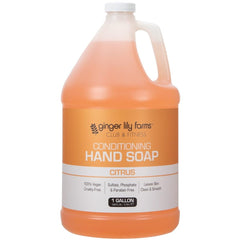 Ginger Lily Farms Club hand soap refill being poured from a 1 gallon container