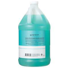Shampoo lather close-up by Ginger Lily Farms showing creamy texture.