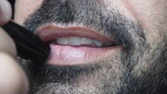 Close-up of lips wearing Girlactik Jello Gloss Balm with gloss