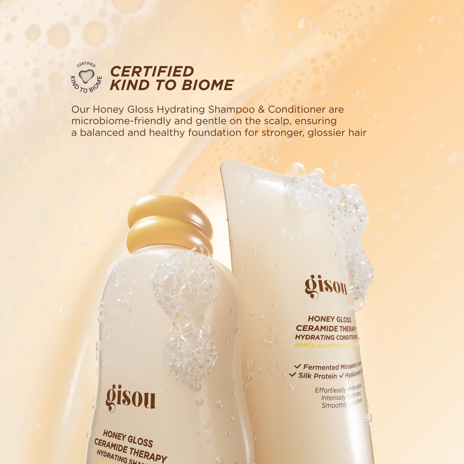 Gisou Honey Gloss Ceramide Therapy Hydrating Shampoo lather in hand reveals cleansing power.