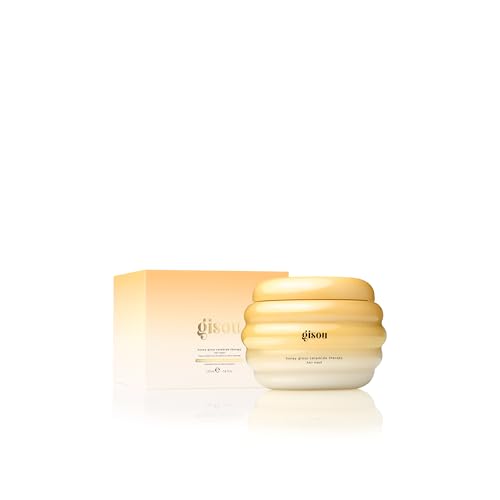 Gisou Honey Gloss Ceramide Therapy Mask applied to hair for instant moisture.