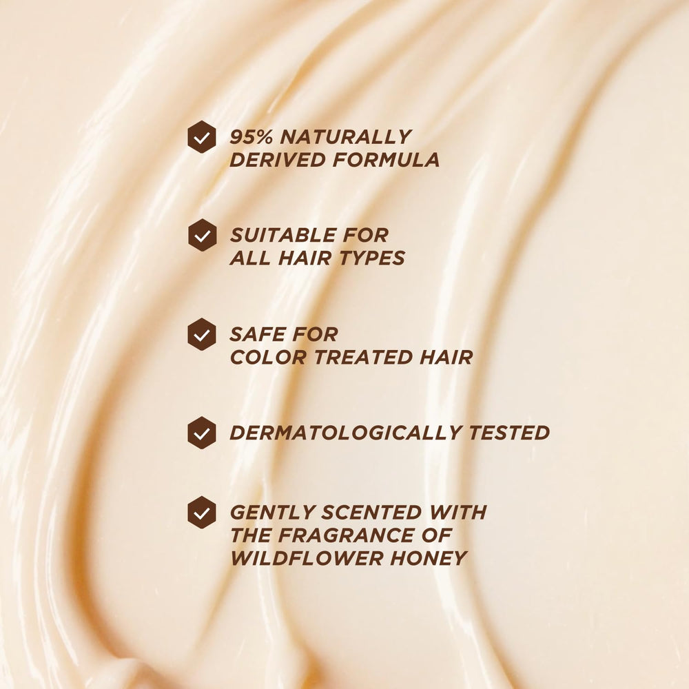 Gisou Honey Gloss Ceramide Therapy conditioner in shower demonstrates frizz control