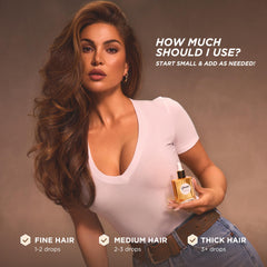 Gisou Honey Infused Hair Oil Mini gloss on hair for a radiant finish.
