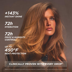 Gisou Honey Infused Hair Oil Mini application on hair showing pre-styling protection.