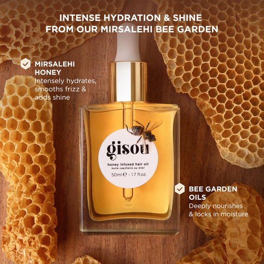 Gisou Honey Infused Hair Oil Mini drop delivering instant shine without weighing hair down.