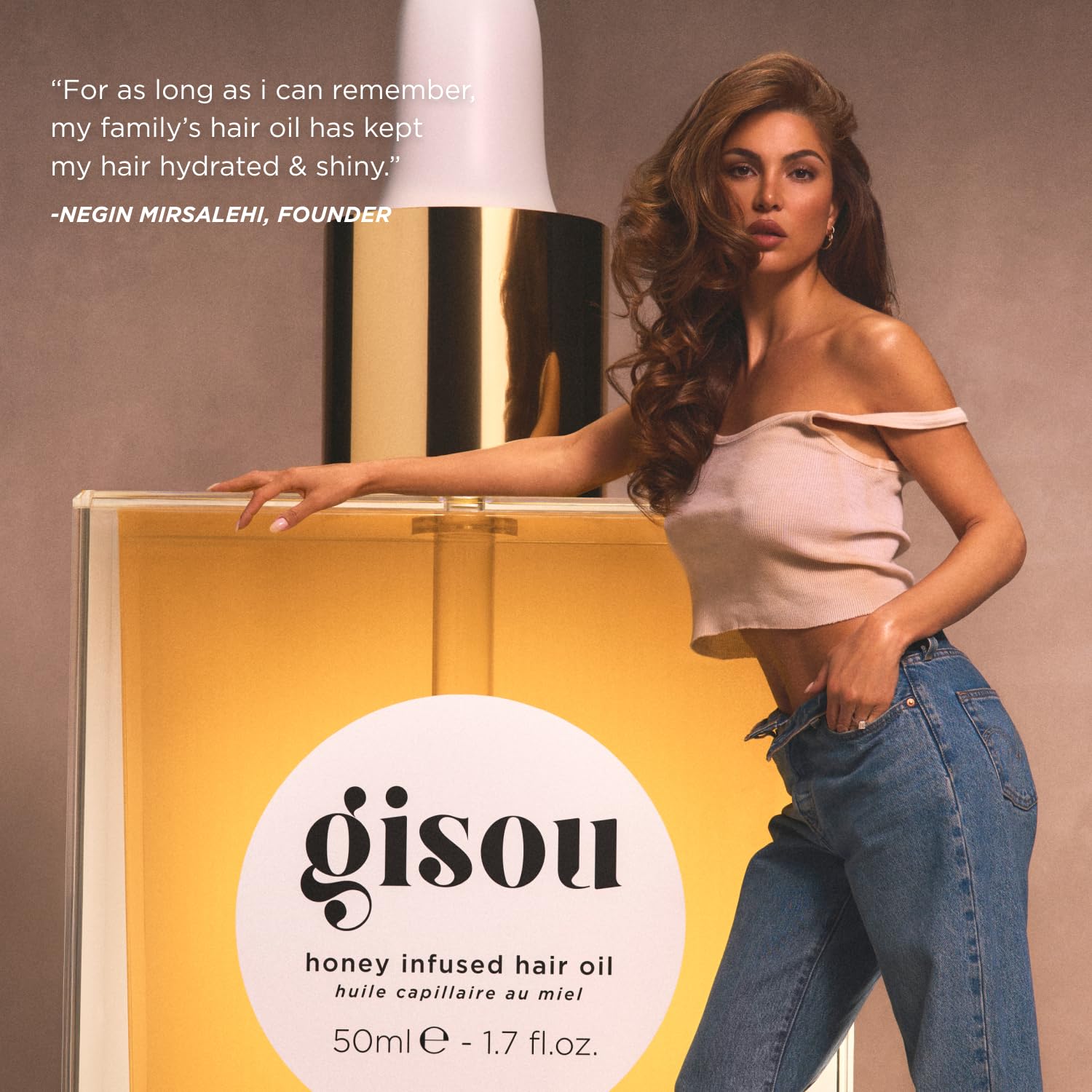 Gisou Honey Infused Hair Oil Mini silky finish for smooth ends.