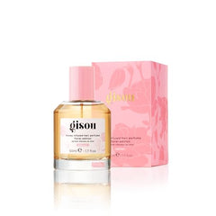 Gisou Honey Infused Hair Perfume mist dispense demonstrates easy, even application