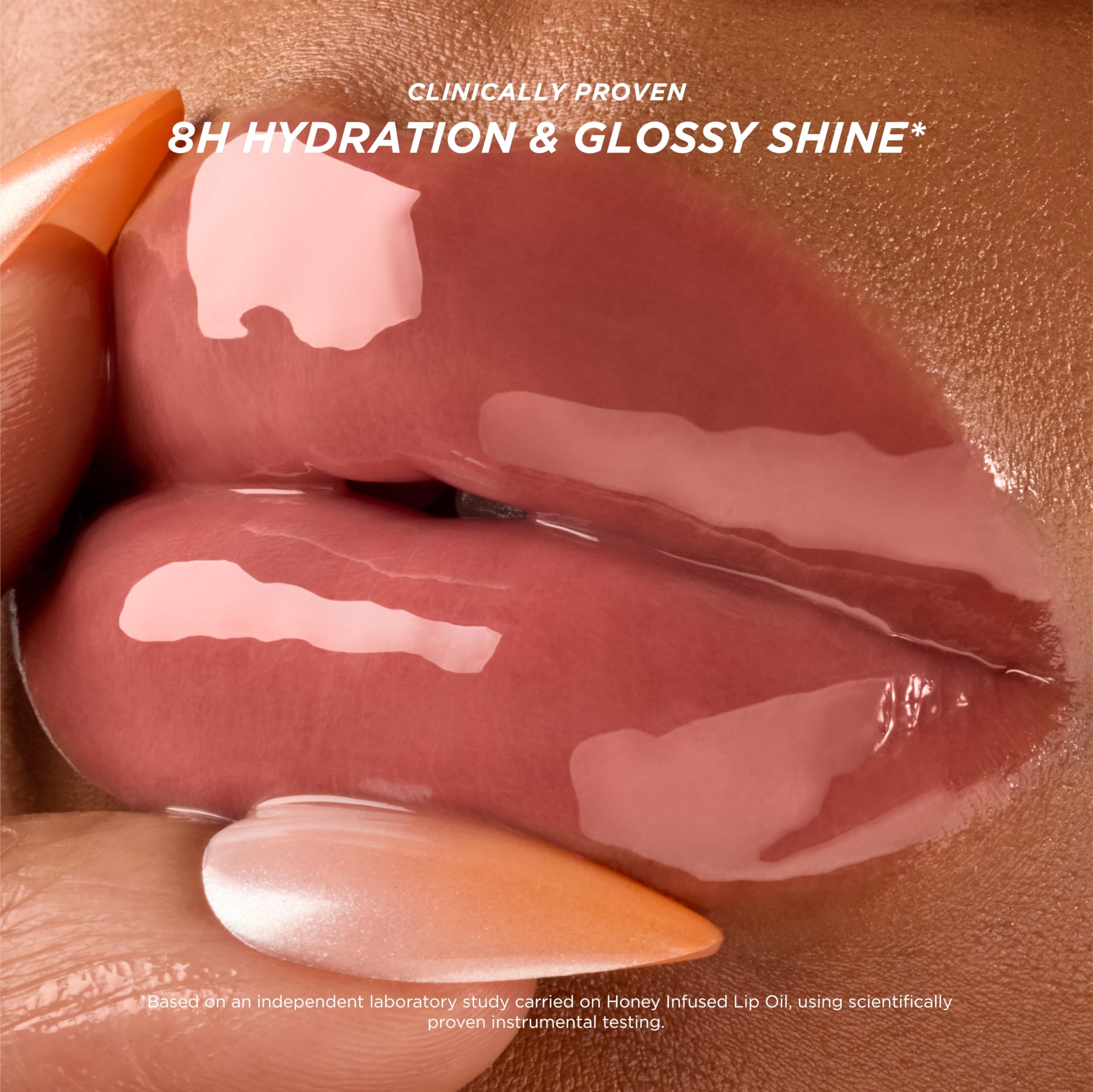 Gisou lip oil applicator close-up shows easy, smooth glide for daily hydration