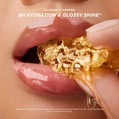 Gisou Honey Gold shade swatch on skin for subtle glossy color