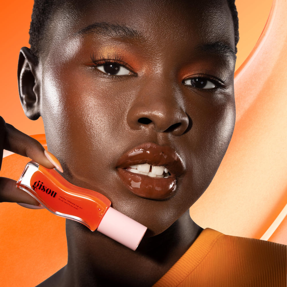 Gisou lip oil highlights honey and jojoba for hydration.