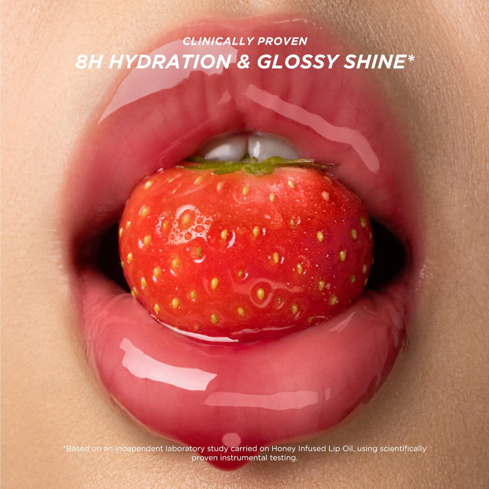 Gisou lip oil shade swatches display Strawberry Sorbet among juicy tones.