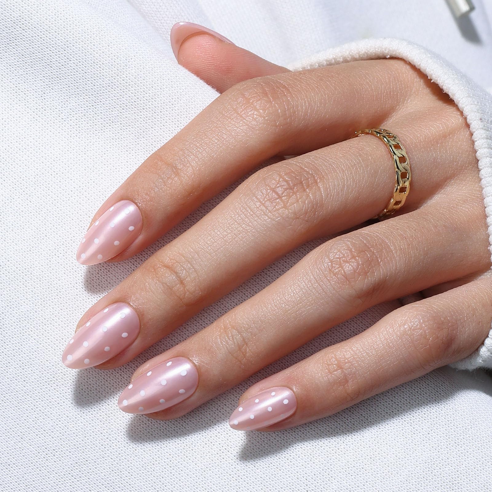 GJZEZ Iridescent pale pink nails offer shimmer without bulk for everyday wear.
