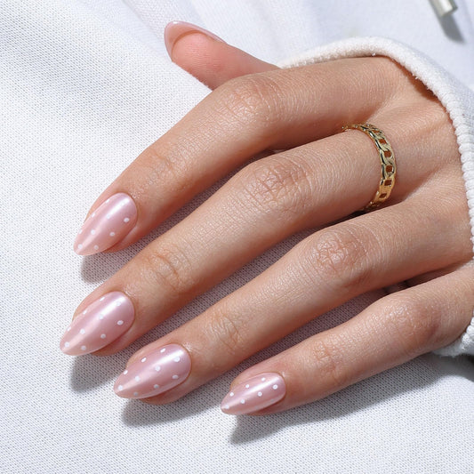 GJZEZ Iridescent pale pink nails offer shimmer without bulk for everyday wear.