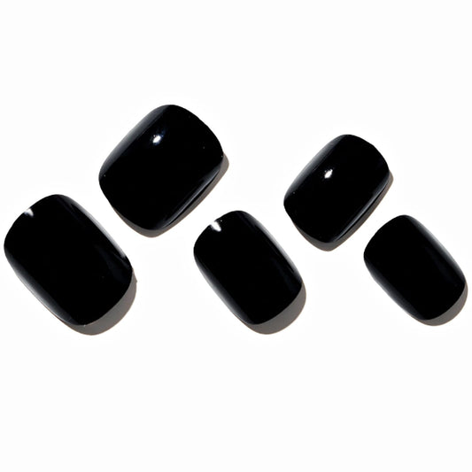 GLAMERMAID gothic black nails on finger with UV gloss for salon-quality finish