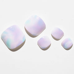 GLAMERMAID adhesive tabs and prep pad for quick at-home manicure.