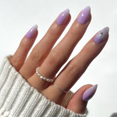 Glamnetic Lilac Reef nails close-up with floral accents for a tropical look