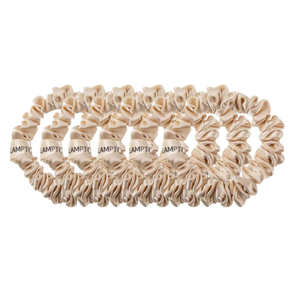 Glampton close-up of satin texture highlighting smooth fabric that reduces friction and breakage