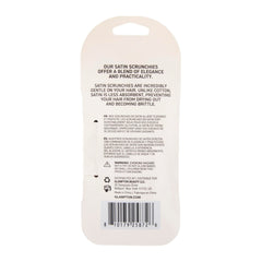 Glampton scrunchie on a pillow by bedside illustrating overnight use to protect hair and preserve moisture
