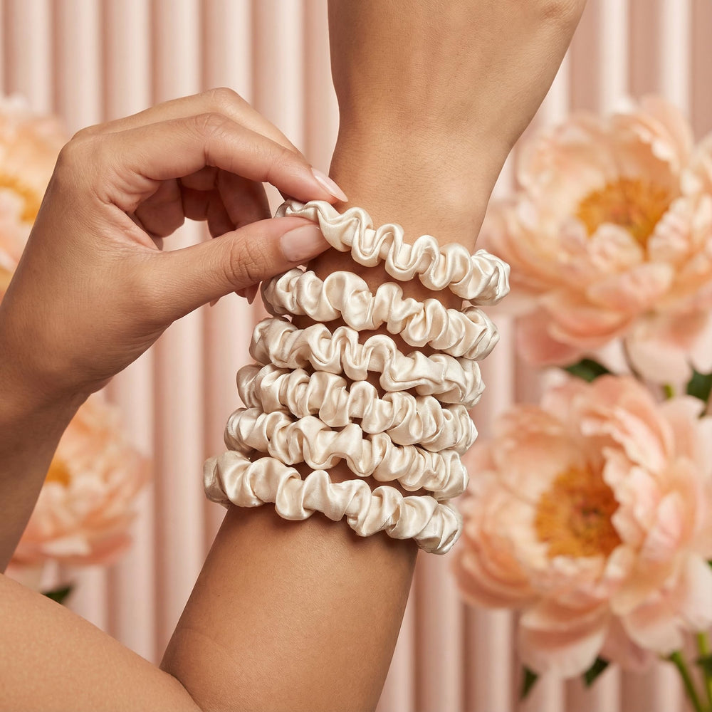 Glampton scrunchie holding a high ponytail demonstrating secure hold without dents or tight creases