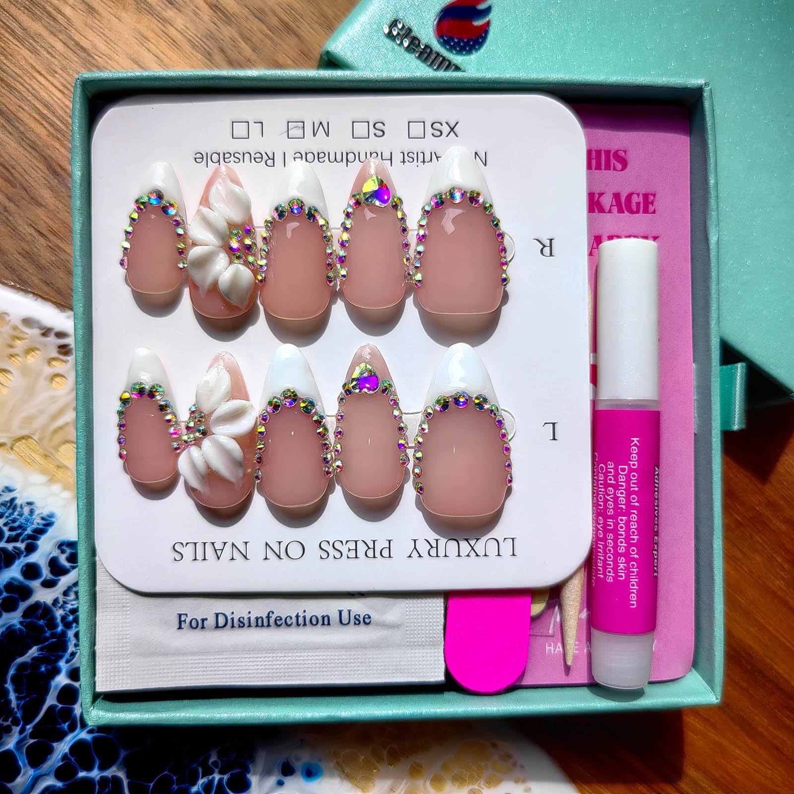 Gleamrain almond nails styled for casual and formal outfits.