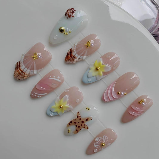 Gleamrain handmade almond nails in nude with delicate flowers for everyday elegance.