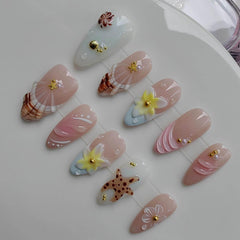 Gleamrain handmade almond nails in nude with delicate flowers for everyday elegance.