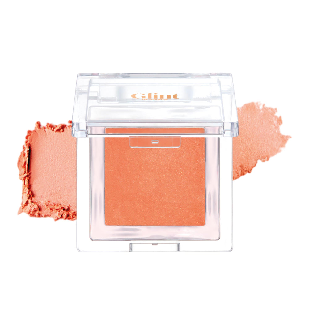 Glint Baked Blush Citrus Pop compact showing a vivid orange-coral flush for lasting color.