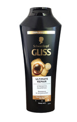 Gliss Kur Ultimate Repair Shampoo being applied during washing for smooth, manageable hair.