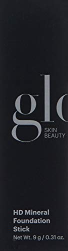 Glo Skin Beauty foundation stick concealing targeted areas for seamless coverage.