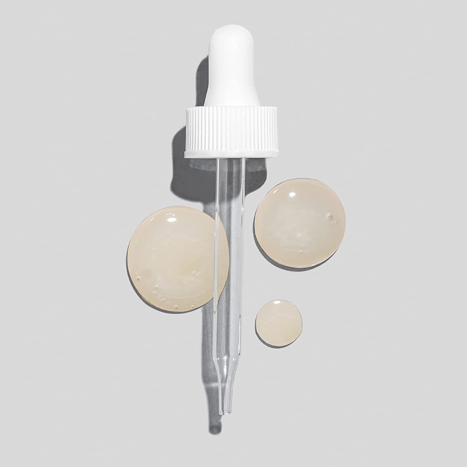 Glo Skin Beauty Hydra-Bright Alpha Arbutin Drops swatch hints at luminous, even skin potential.