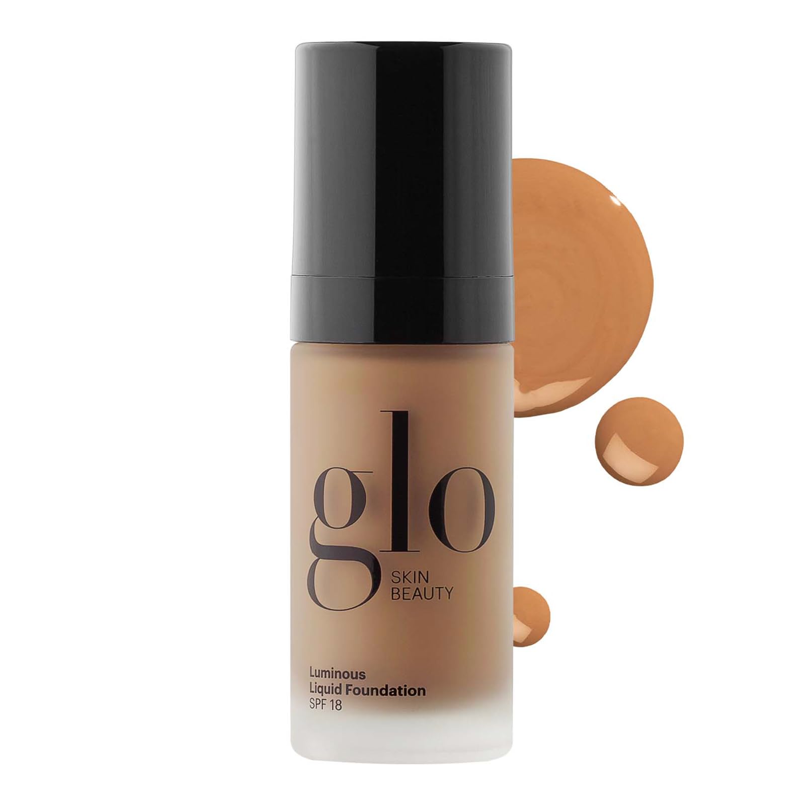 Glo Skin Beauty Luminous Foundation bottle with SPF 18 for radiant, even-toned skin.