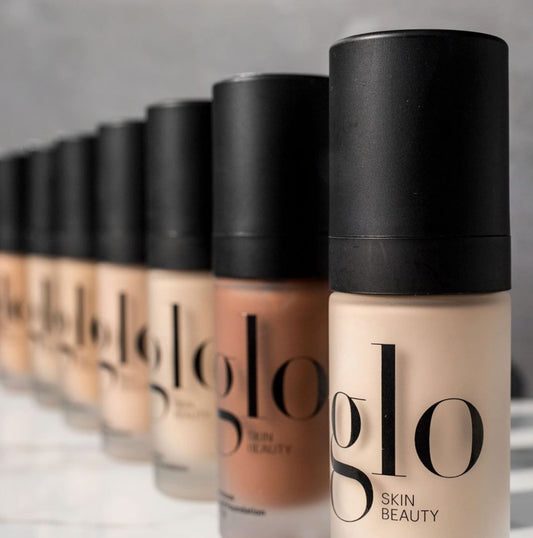 Glo Skin Beauty Luminous Foundation pump top showing easy, mess-free application.