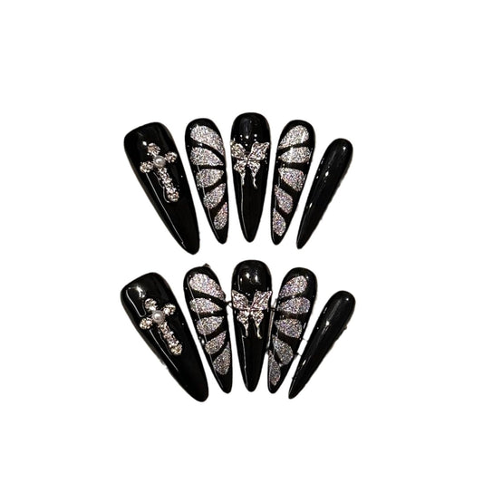 GLORS black and silver butterfly cat eye nails in long stiletto shape for bold at-home manicure