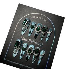 GLORS blue glitter Medusa-inspired long-stiletto nails with rhinestones for dramatic at-home manicure.