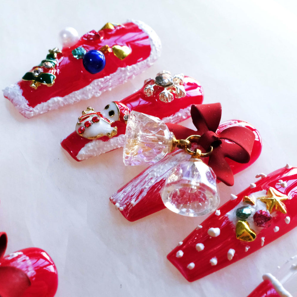 GLORS holiday-themed design with snowflakes and snowmen accents.