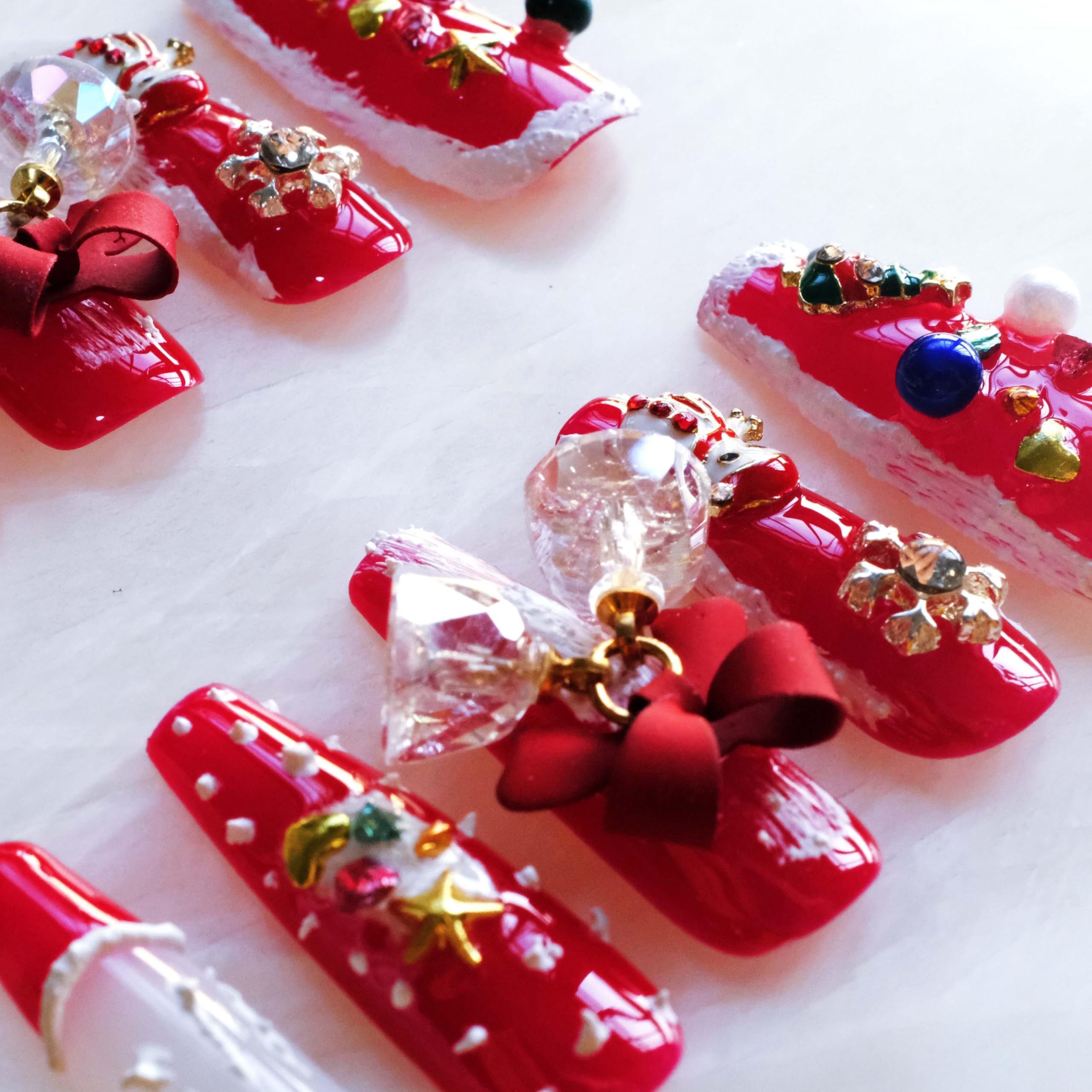 GLORS nails with transparent ice elements for an ethereal effect.