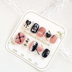 GLORS hand-painted graffiti nail art sticker in black and pink for instant style.