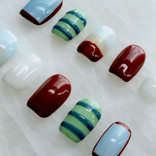 GLORS Handcrafted nail art close-up showing intricate detail.