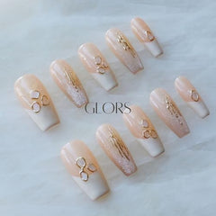 GLORS long ballerina nails showcasing pink to white gradient and shimmering shell pieces