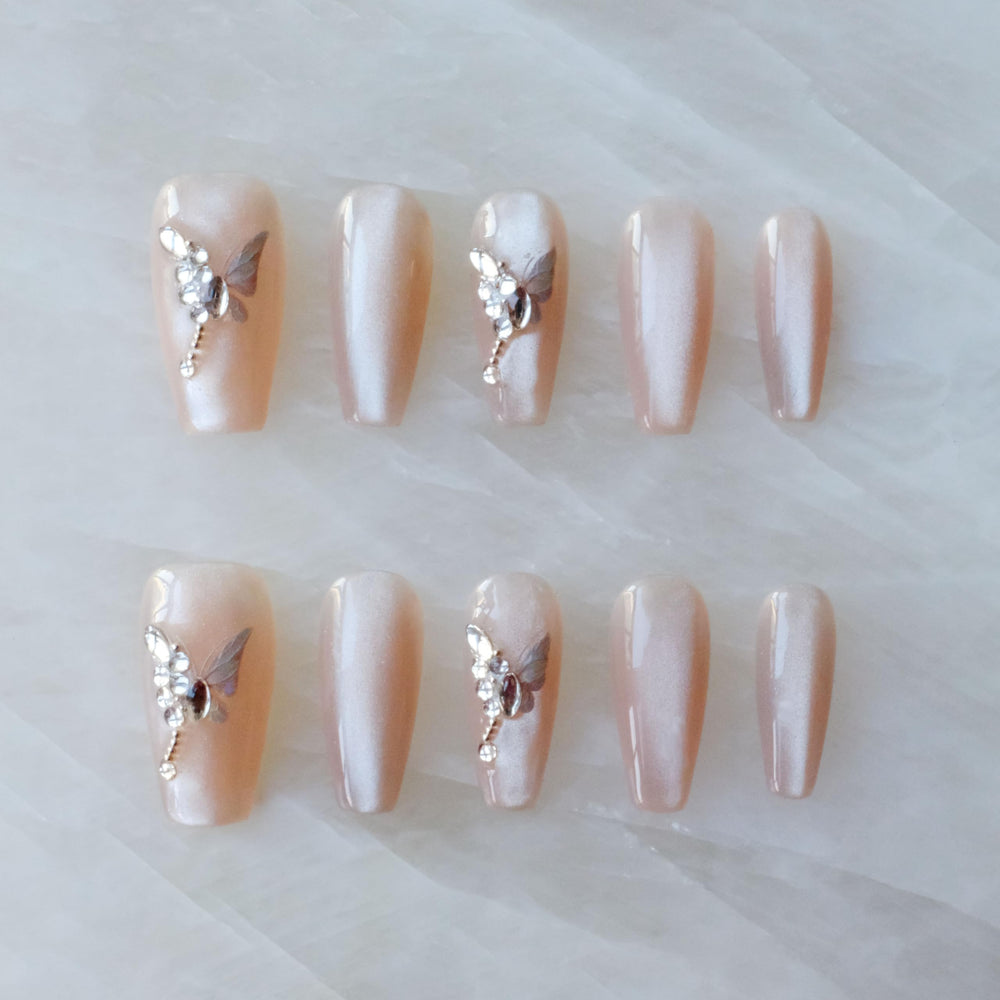 GLORS long ballerina nails in nude pink for a dramatic, salon-ready manicure.