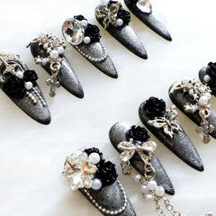 Gothic chic GLORS nails suitable for formal events.