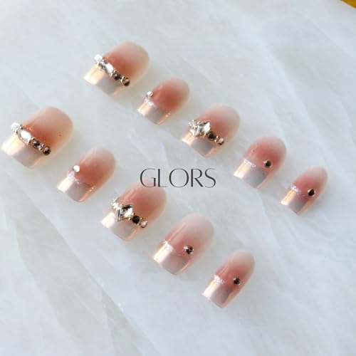 GLORS Moon Dream pink French-style tips with a diamond accent for elegant nail art