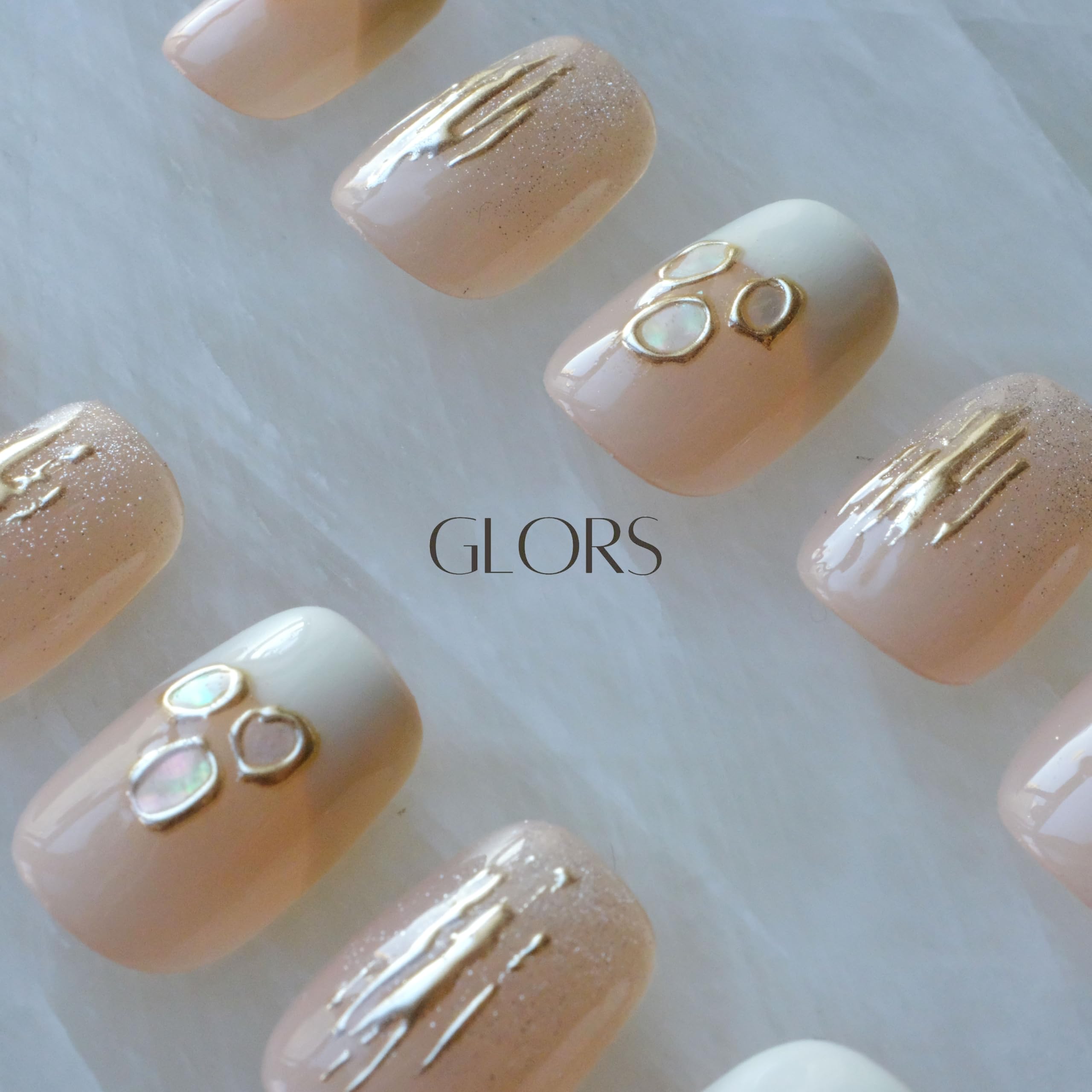 GLORS Nails collection display featuring Mica Love in chic setting