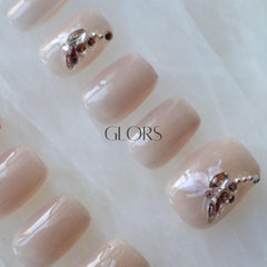 GLORS nails displayed from multiple angles emphasize length and shimmer