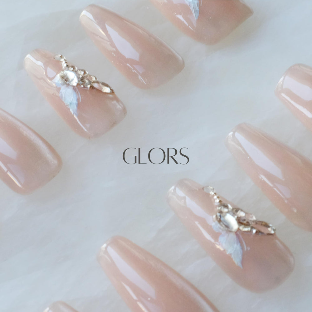 Nude pink base GLORS nails pairing with many outfits
