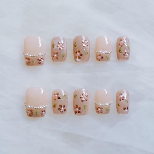 GLORS nude pink base nails with rose gold foil and pearl accents for weddings