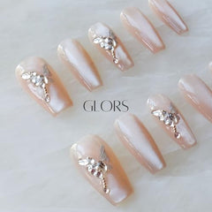 GLORS glossy finish adds salon-quality shine to nude pink nails.