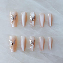 GLORS press-on nails in long ballerina coffin nude pink for a salon-ready look