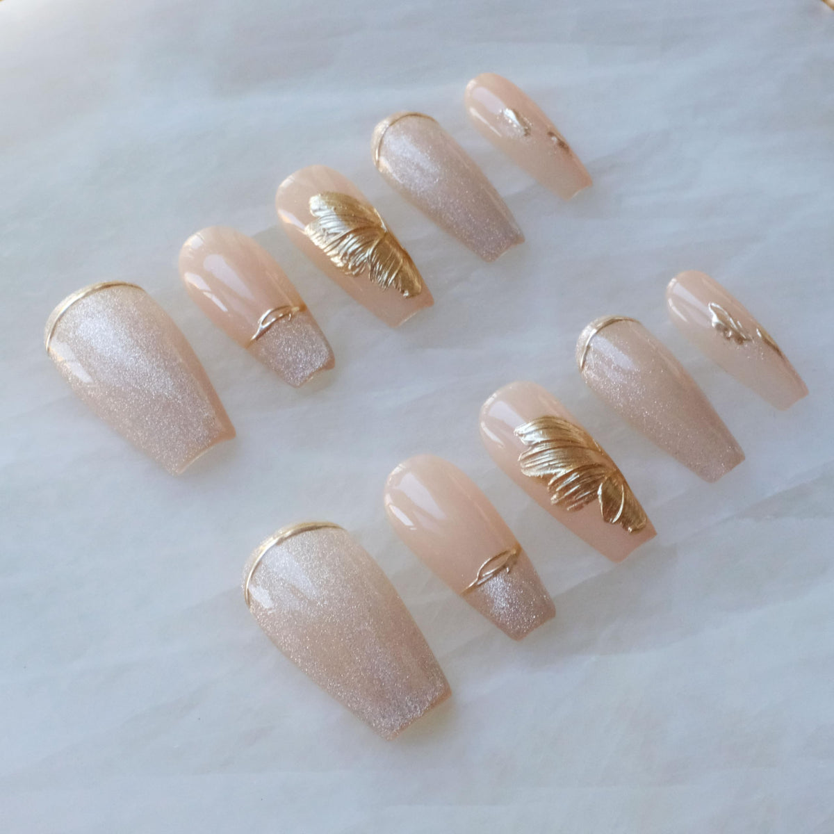 GLORS press-on nails long ballerina nude pink with gold accents for at-home salon-quality results.