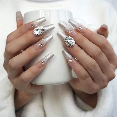 GLORS nails with silver glitter French tips and rhinestones for subtle luxury.